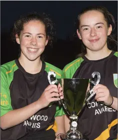  ??  ?? Clan na Gael’s Sophie and Jamie Carr with the cup.