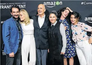  ?? MARIO ANZUONI/REUTERS ?? Creator of the show Jill Soloway (third right) poses with cast members (from left) Jay Duplass, Judith Light, Jeffrey Tambor, Gaby Hoffmann and Amy Landecker at a premiere screening for the television series “Transparen­t” at Directors Guild of America in Los Angeles, in 2016.