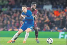  ?? FOTO: PEP MORATA ?? Eden Hazard, en pugna con Umtiti en octavos de la pasada Champions