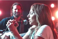  ??  ?? Cooper and Lady Gaga in ‘A Star is Born’. The film received five nomination­s including for top acting and movie prizes. — Courtesy of Warner Bros. Pictures