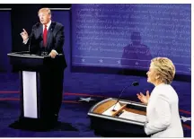  ?? MARK RALSTON / GETTY IMAGES ?? Republican candidate Donald Trump speaks during the third and final presidenti­al debate Wednesday night in Las Vegas with Democratic candidate Hillary Clinton.