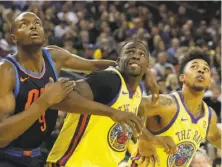  ?? Paul Kuroda / Special to The Chronicle ?? The Warriors’ Draymond Green (23) and Nick Young (6) both played with renewed passion in the win over the Thunder.