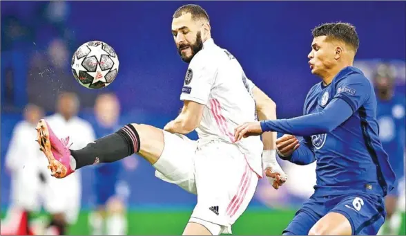  ?? AFP ?? Chelsea’s Brazilian defender Thiago Silva (R) vies with Real Madrid’s French forward Karim Benzema during the Champions League second leg semi-final football match last year.