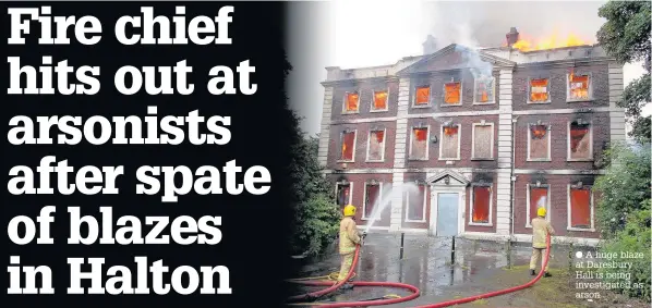  ??  ?? A huge blaze at Daresbury Hall is being investigat­ed as arson