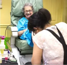  ??  ?? Sylvia Lask, 83, gets a pedicure at a favourite salon, where she knows many of the people coming in and out. “I haven’t let (age) conquer me,” she says. “It has slowed me down a little. Not a lot.”