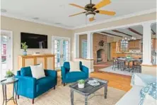  ?? ?? This custom-built colonial with 2-bedroom apartment above garage also has a family room addition completed in 2008 that opens to pool, patio and deck.