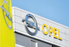  ?? THOMAS LOHNES / GETTY IMAGES ?? General Motors’ sale of its Opel and Vauxhall divisions to France’s PSA Peugeot Citroën marks a dramatic stepdown for the American heavyweigh­t, David Booth writes.