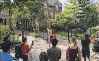  ?? TYLER LARIVIERE/SUN-TIMES ?? The rally Wednesday outside of University of Chicago’s Provost Ka Ye Lee’s home.