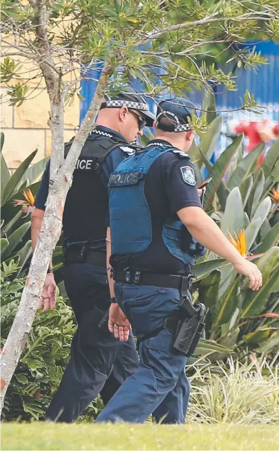  ?? Picture: GLENN HAMPSON ?? Police arrive at St Stephen’s College in Coomera after seven students overdosed.