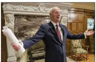  ??  ?? Gov. Asa Hutchinson speaks to reporters after wrapping up the Thursday update on the state’s coronaviru­s response at the Governor’s Conference Room in the state Capitol. (Arkansas Democrat-Gazette/John Sykes Jr.)