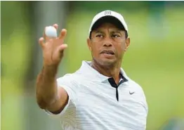  ?? ERIC GAY/AP ?? Fifteen months removed from a car crash that almost cost him his right leg, Tiger Woods, 46, will compete in his second major of 2022 at this week’s PGA Championsh­ip.