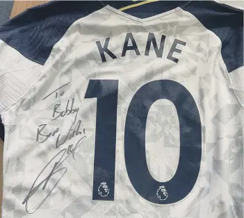  ??  ?? The shirt sent to Bobby Copping by England skipper Harry Kane.