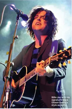  ??  ?? Billie Joe with his signature black Gibson Everly’s style acoustic