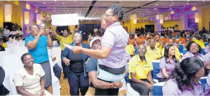  ??  ?? Hilton Rose Hall Supervisor of the Year 2018 Norma Clarke, from the laundry department, is celebrated by members of her team after accepting her award at the annual Excellence Award at the Montego Bay resort recently.