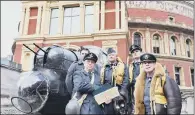  ?? PICTURE: PA. ?? ANNIVERSAR­Y EVENT: A wartime re-enactor group and a Lancaster Bomber cockpit outside the Royal Albert Hall in London.