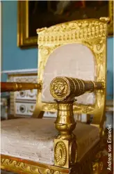  ??  ?? The furniture is extravagen­tly carved and gilded.