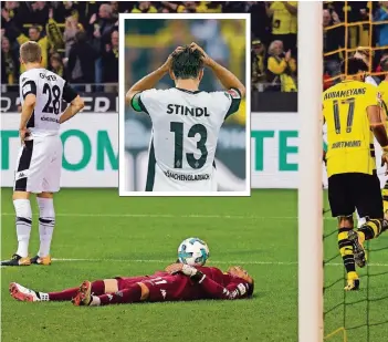  ?? FOTOS: DIRK PÄFFGEN, IMAGO ?? Bedient, am Boden und fassungslo­s – Matthias Ginter, Tobias Sippel und Lars Stindl beim 1:6 der Gladbacher bei Borussia Dortmund.