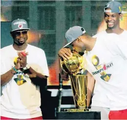 ?? TAIMY ALVAREZ/STAFF FILE ?? Dwyane Wade helped lift the Heat to three NBA titles during his 13 seasons in Miami.