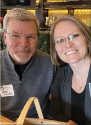  ?? SUBMITTED ?? North Coast Chamber of Commerce executive director Steve Corcoran meets with the North Olmsted chamber director Maria Sabala at Westlake’s State of the City address on Feb. 14.