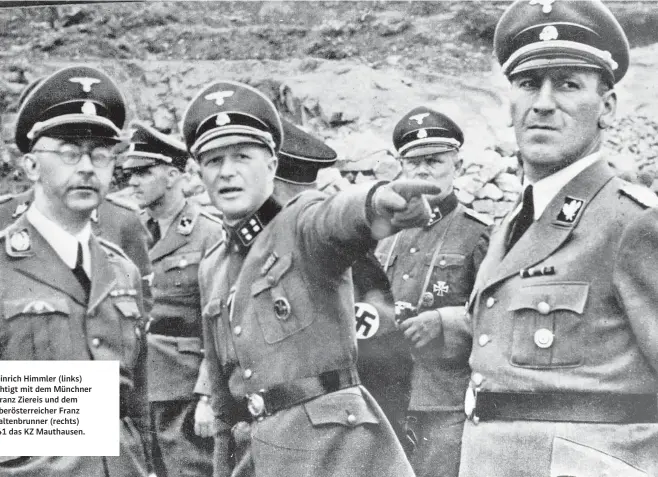  ?? ?? Heinrich Himmler (links) besichtigt mit dem Münchner Franz Ziereis und dem Oberösterr­eicher Franz Kaltenbrun­ner (rechts) 1941 das KZ Mauthausen.