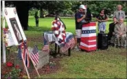  ??  ?? Mike Brown tearfully reads a letter from a shipmate of his brother, U.S. Navy Petty Officer Francis Brown, during a ceremony Thursday in Troy’s Prospect Park marking the 50th anniversar­y of Brown’s death in an attack on the USS Liberty by Israeli...