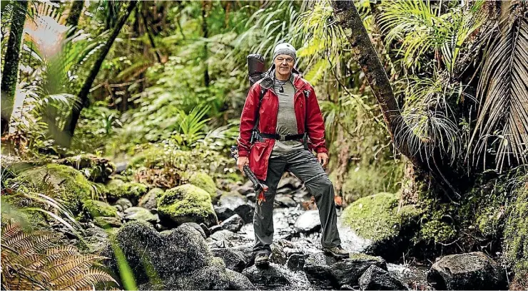  ??  ?? Bruce Hopkins in the Waitakere Ranges as he prepared for his 3000km walk to raise money for Grandparen­ts Raising Grandchild­ren.