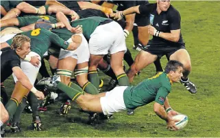  ?? /AFP Photo ?? Scrum sensation: Joost van der Westhuizen clears the ball out of a scrum during the 2003 Rugby World Cup quarterfin­al match between New Zealand and SA. The rugby star, who was battling motor neuron disease, died on Monday aged 45.