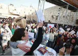  ??  ?? MEMBERS OF Women of the Wall pray at the Western Wall yesterday.