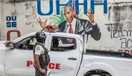  ?? AFP ?? La Policía de Haití activó un orden de búsqueda contra el exfunciona­rio público Joseph Felix Badio por su presunta participac­ión en el magnicidio, mientras Colombia colabora en la pesquisa.