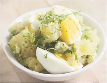  ??  ?? Warm Potato Salad with Mustard, Herbs and Boiled Eggs (Photo by Cynthia Nelson)