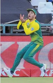  ?? AFP ?? South Africa’s Farhaan Behardien goes for a catch during their third T20 cricket match against India at Newlands Cricket Ground on Saturday in Cape Town. —