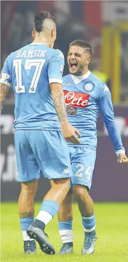  ?? GETTY IMAGES ?? La gioia di Hamsik e Insigne dopo il 3-0 del Napoli