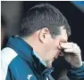  ?? Picture: SNS. ?? Saints boss Tommy Wright felt the pressure as his side battled to a precious 1-0 win.