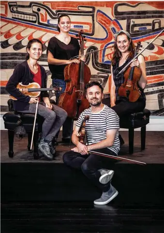  ?? Brett Coomer / Staff photograph­er ?? The Elias String Quartet includes, clockwise from left, Sara Bitlloch, Marie Bitlloch, Simone van der Giessen and Donald Grant.