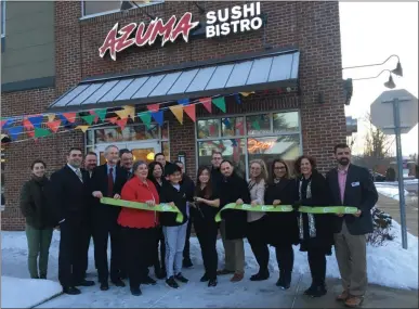  ?? LAUREN HALLIGAN - MEDIANEWS GROUP ?? A ribbon cutting ceremony is held during Azuma Sushi Bistro’s grand opening event earlier this month at 2452 Rt. 9 in Malta.