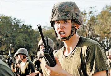  ?? BOLAND FAMILY PHOTO ?? Zachary Boland, 18, trains at boot camp. Boland died from pneumonia, a condition he hid from drill instructor­s. His mother, Sam Boland said, “We respect these men that he was with, and we have no hard feelings toward any of them.”