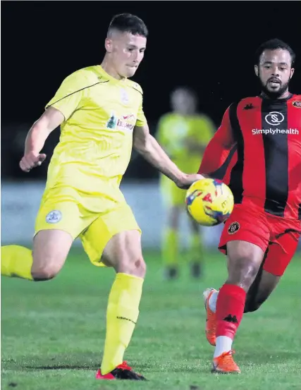  ?? Picture: Naomi Baker/Getty ?? Archie Ferris, left, seen here playing in last Tuesday’s FA Cup defeat at Winchester City, scored Clevedon Town’s equaliser in the 2-2 draw at Bradford Town