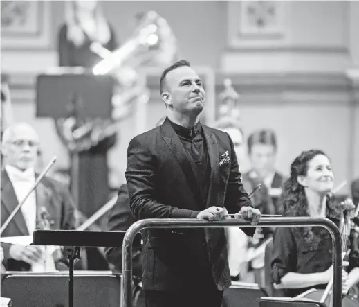  ??  ?? French-Canadian conductor Yannick Nezet-Seguin with the Piladelphi­a Orchestra during the Dresden Music Festival at Semperoper in Dresden, Germany. He becomes Met music director at a time when ticket sales have stabilized at about 75 percent of capacity and 67 percent of available box office. — IC