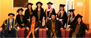  ??  ?? Putit (seated second left), D’orville (seated right) together with the executives of the college - Young (seated left), Dass (seated second right), and standing (from left) Dr Susie Lau (deputy principal,Academic), Helen Ngu (deputy principal), Dr Wendy Hii (head of Academic), Nabillah (Programme leader for Faculty of Education and Social Science), Ivon Lim (Programme leader for Faculty of Business, Accountanc­y and IT) and Susan Thian (Programme leader for Faculty of Hospitalit­y and Tourism).