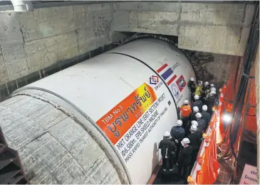  ?? SOMCHAI POOMLARD ?? Transport Minister Saksayam Chidchob presides over a ceremony to mark the start-up of a third tunnel boring machine on the Orange Line’s east section stretching from the Thailand Cultural Centre to Min Buri.