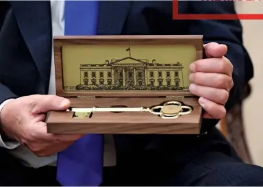  ??  ?? UNLOCKING A NEW MIDEAST Below: Netanhayu displays his gold key from Trump; Right: Leaders of Israel, UAE and Bahrain sign the Abraham Accords.
