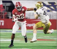  ?? Michael Ainsworth / Associated Press ?? Alabama running back Najee Harris (22) runs the ball and fights off a tackle attempt by Notre Dame linebacker Drew White in the second half of the Rose Bowl on Friday.