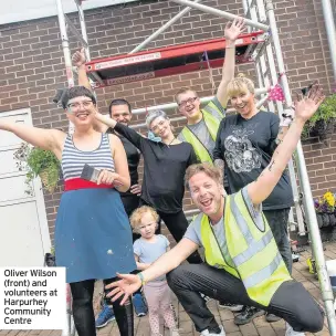  ??  ?? Oliver Wilson (front) and volunteers at Harpurhey Community Centre