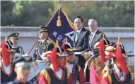  ??  ?? U.S. Defense Secretary Jim Mattis, right, and South Korean Defense Minister Song Young-moo inspect an honor guard during a welcoming honor guard ceremony Saturday in Seoul, South Korea.