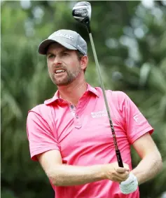  ?? — AFP photo ?? Webb Simpson plays his shot from the second tee during the final round of THE PLAYERS Championsh­ip on the Stadium Course at TPC Sawgrass in Ponte Vedra Beach, Florida.