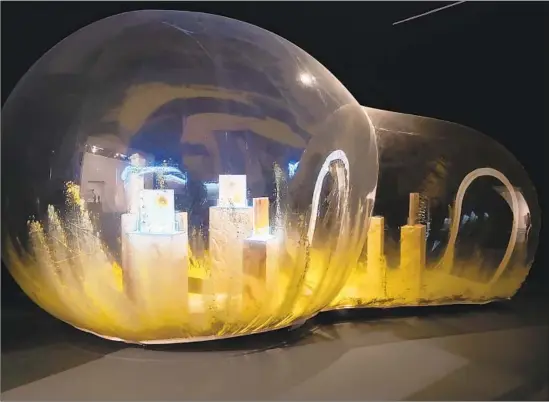  ?? Christophe­r Knight Los Angeles Times ?? ANICKA YI’S “Le Pain Symbiotiqu­e” (2014) fills a room. In its inflated-plastic, lightbulb-shaped environmen­t, microbial yeast, mold and bacteria grow relentless­ly.