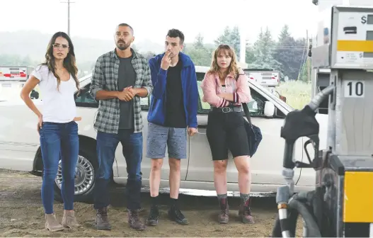 ?? ELEVATION PICTURES ?? Things don’t go well for comic-book creator Todd (Jesse Williams, second from left), his girlfriend, Kathy (Jordana Brewster, left), publisher Ezra (Jay Baruchel) and assistant Aurora (Niamh Wilson) when they head to the area where a killing spree occurred 20 years earlier in Random Acts of Violence.