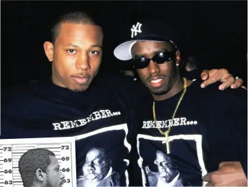  ?? ?? BAD BOY FOR LIFE
Right: Shyne with Combs at the 1998 Grammys. Shyne was the hottest
young rapper out of Brooklyn, and signed with Bad Boy because
he felt a kinship with Combs, who
also grew up without a father. In
1999, they were involved in a club
shooting that landed Shyne in prison for 10 years. “I took the fall for my friends,” he says. “But that’s
the way life is.”