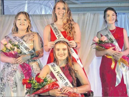  ?? ERIC MCCARTHY/JOURNAL PIONEER ?? Taylor Rix, Miss Potato Blossom 2017, crowns her successor, Joselyn Jelley. Jelley also received banners for Miss Talent and Miss Fitness. Looking on, from left, are Second Runner-up Taylor Buote and First Runner-up and Miss Friendship, Jessica Howard.