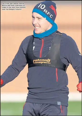  ??  ?? Get a hat, get ahead...Barrie McKay will have a decision to make in the next few months over his Rangers futurre